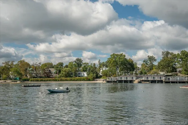 a view of a lake with a big yard