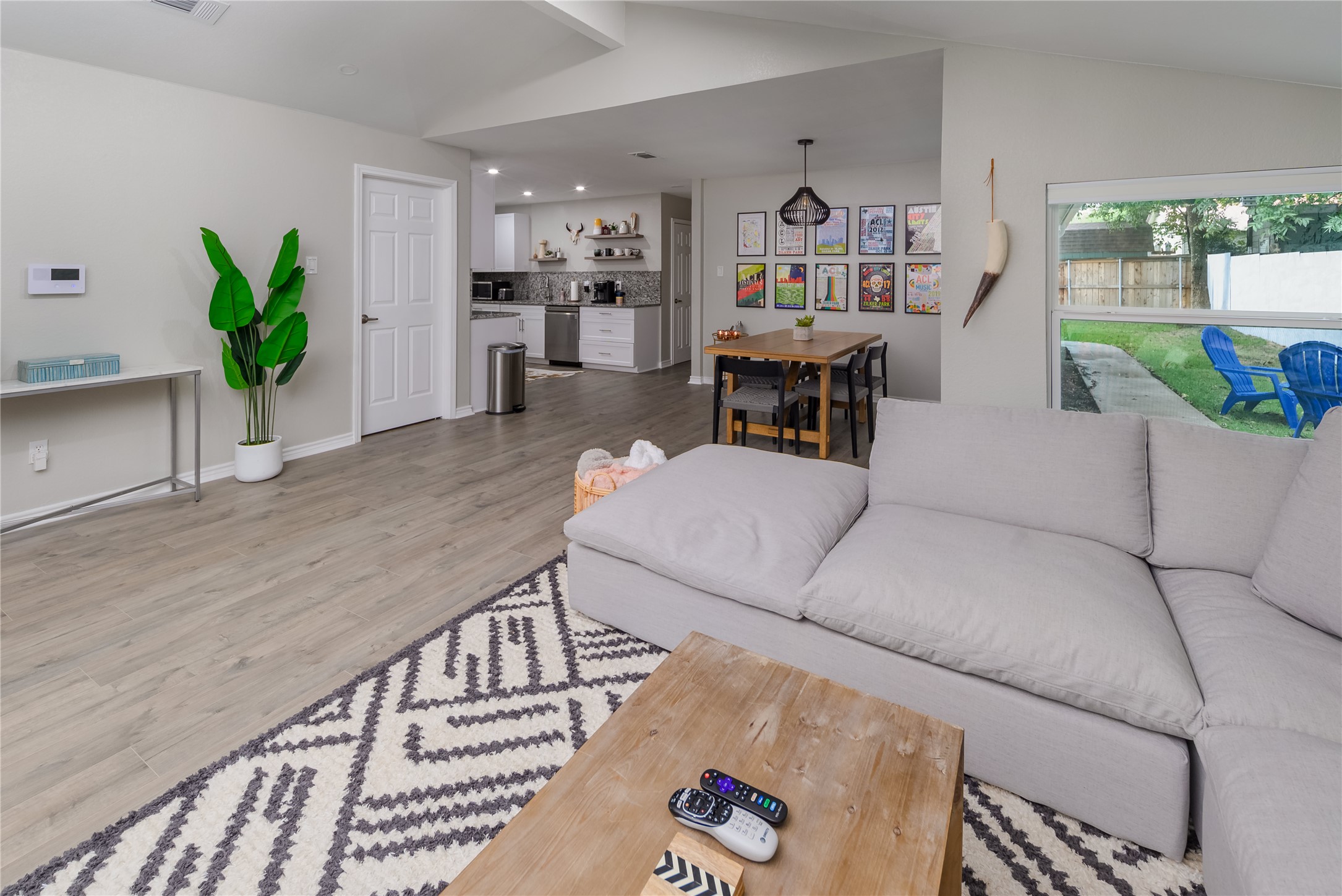 1651 Chippeway Lane Austin, TX 78745 - Photo 6 of 26 a living room with furniture and a potted plant