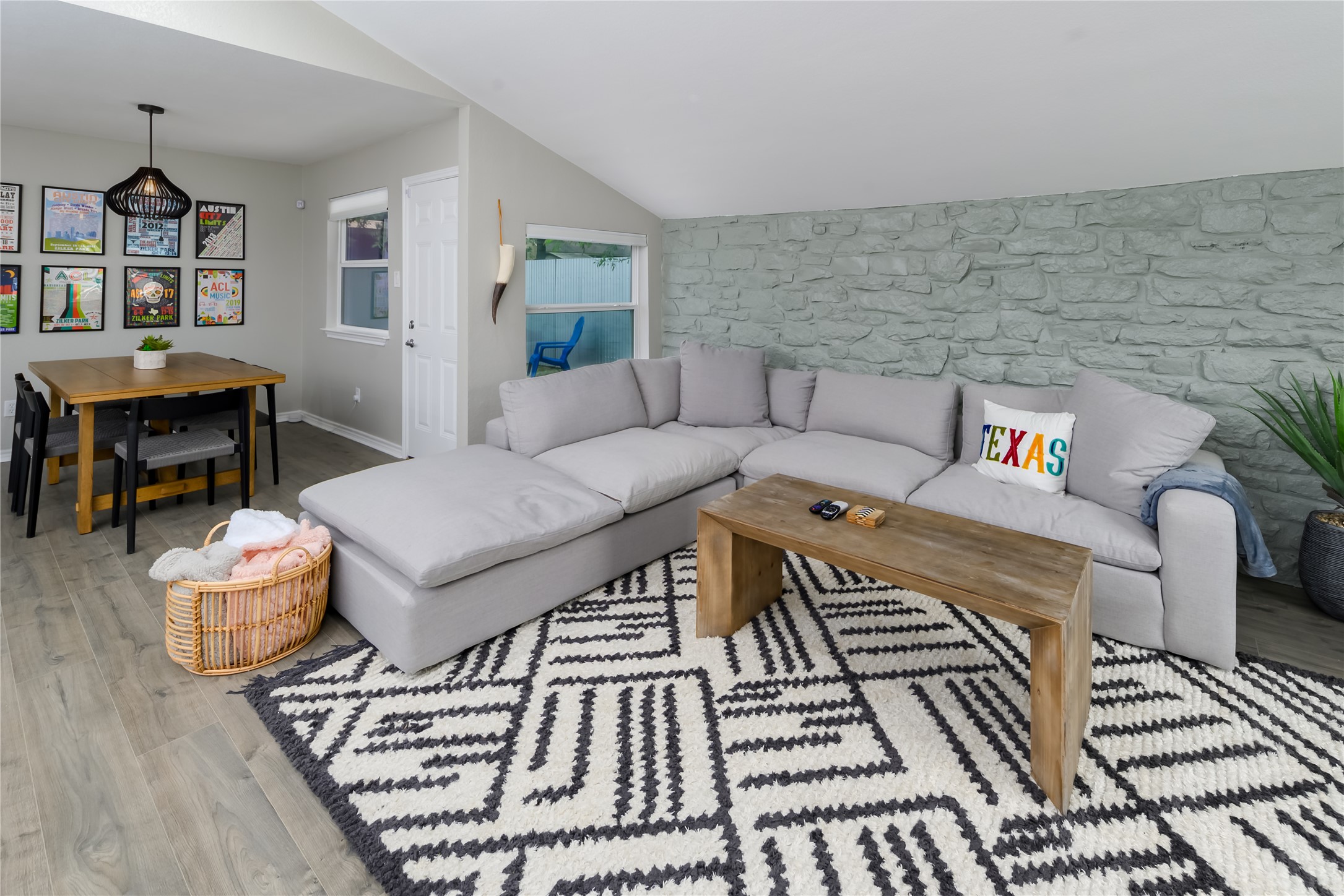 1651 Chippeway Lane Austin, TX 78745 - Photo 10 of 26 a living room with furniture and a rug