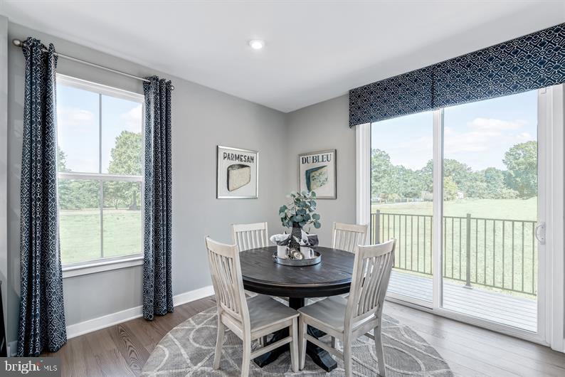 3452 Jacobs Ford Way Hanover, MD 21076 - Photo 9 of 28 a view of a dining room with furniture window and outside view