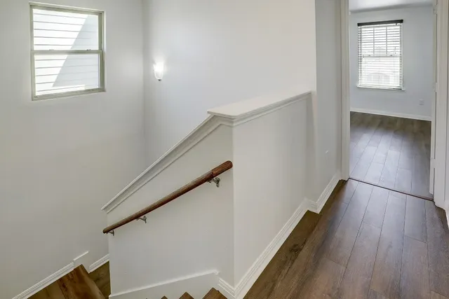 a view of entryway with wooden floor