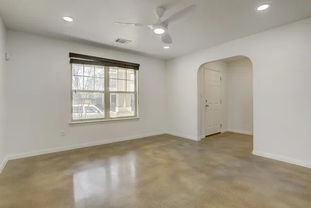 an empty room with windows