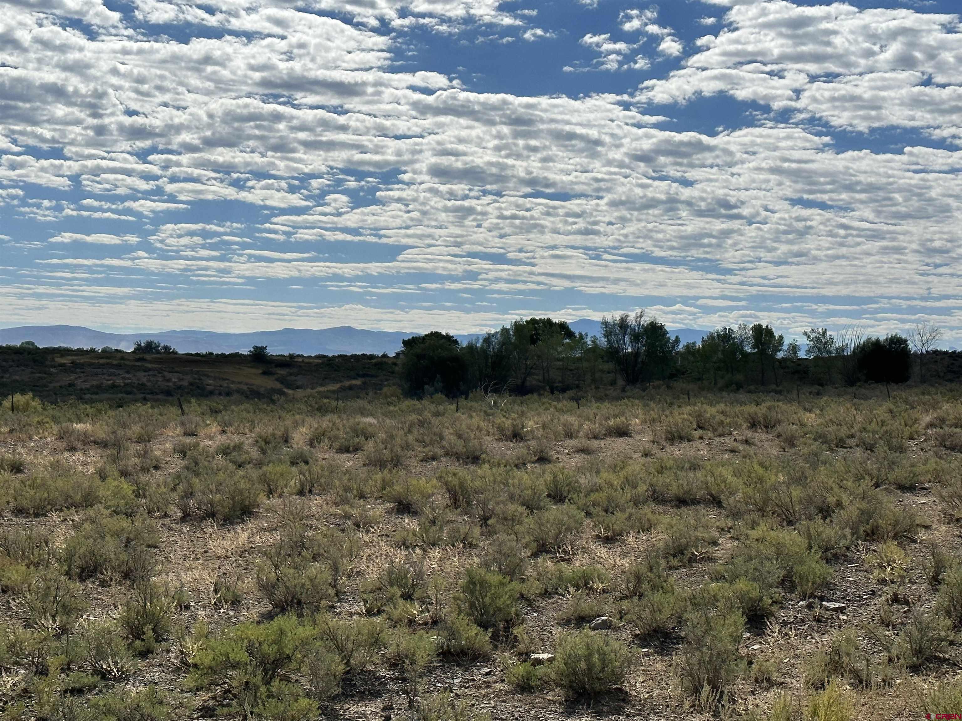 Tbd Jig Road Montrose, CO 81403 - Photo 7 of 8 a view of ocean with beach