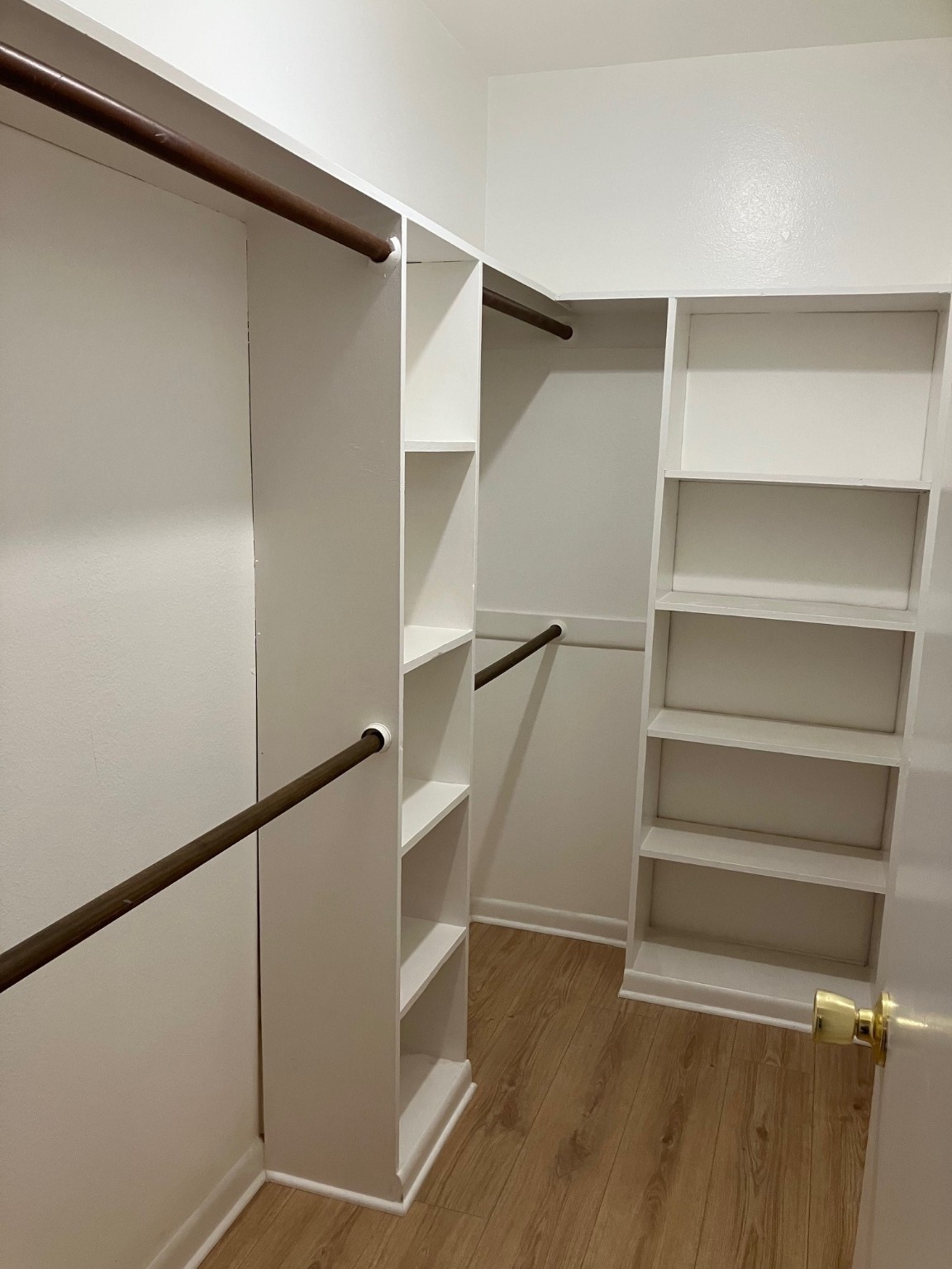 701 Rosedale Street, Unit H Houston, TX 77006 - Photo 17 of 20 a view of walk in closet with empty racks