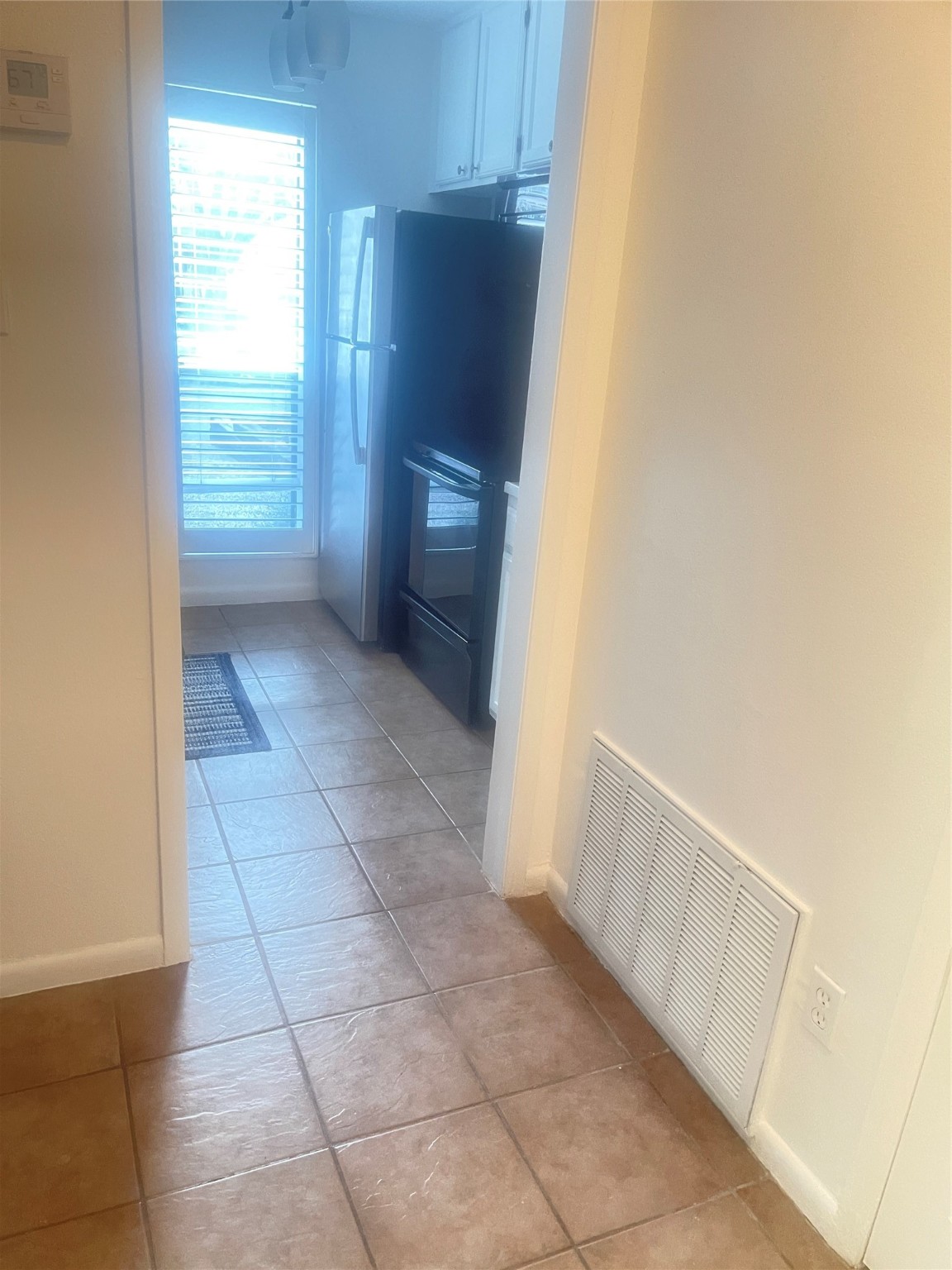 701 Rosedale Street, Unit H Houston, TX 77006 - Photo 6 of 20 a bathroom with a vanity and a shower