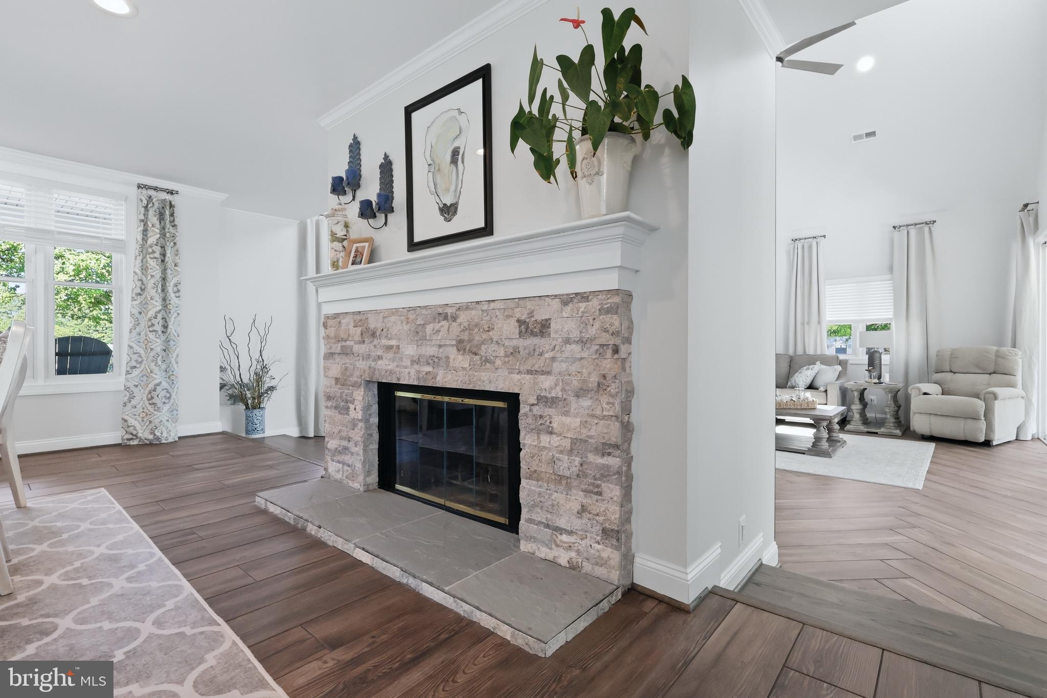 38980 Hodges Road Avenue, MD 20609 - Photo 31 of 98 Stone fireplace in casual dining area