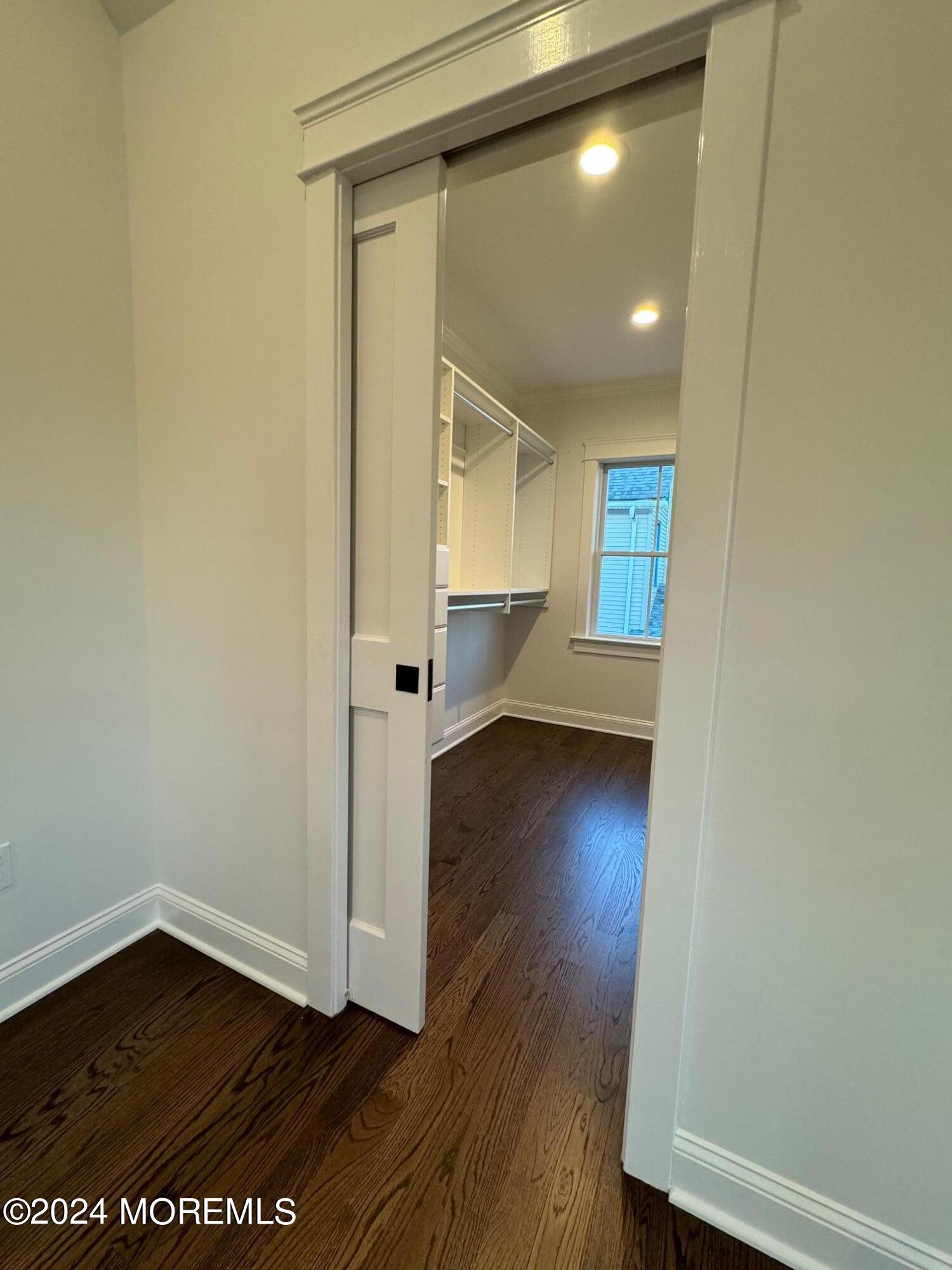 67 Sunset Avenue Red Bank, NJ 07701 - Photo 14 of 39 a view of a hallway with wooden floor