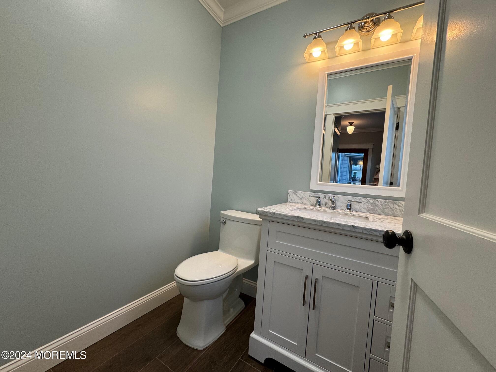 67 Sunset Avenue Red Bank, NJ 07701 - Photo 22 of 39 a bathroom with a sink and a toilet