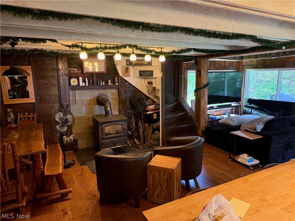 11811 Gaston Road Rogers, OH 44455 - Photo 15 of 38 Enjoy your time inside this cozy, functional, and equipped log cabin! You've already got the important utilities like electric, geo-thermal heat, a septic system installed 6 years ago, and private well water.
