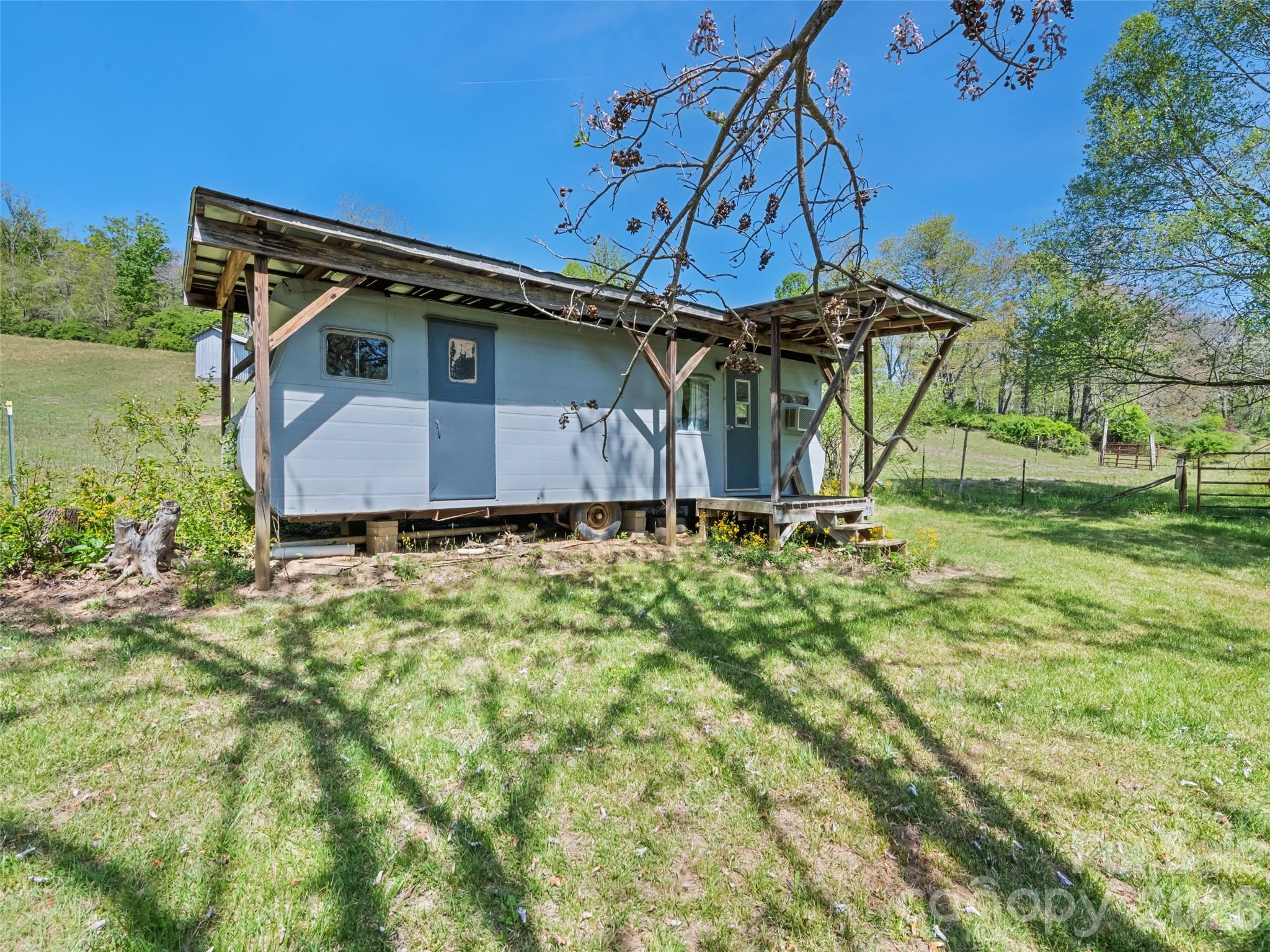 1372 Sand Branch Road Black Mountain, NC 28711 - Photo 30 of 45 a house view with a backyard space
