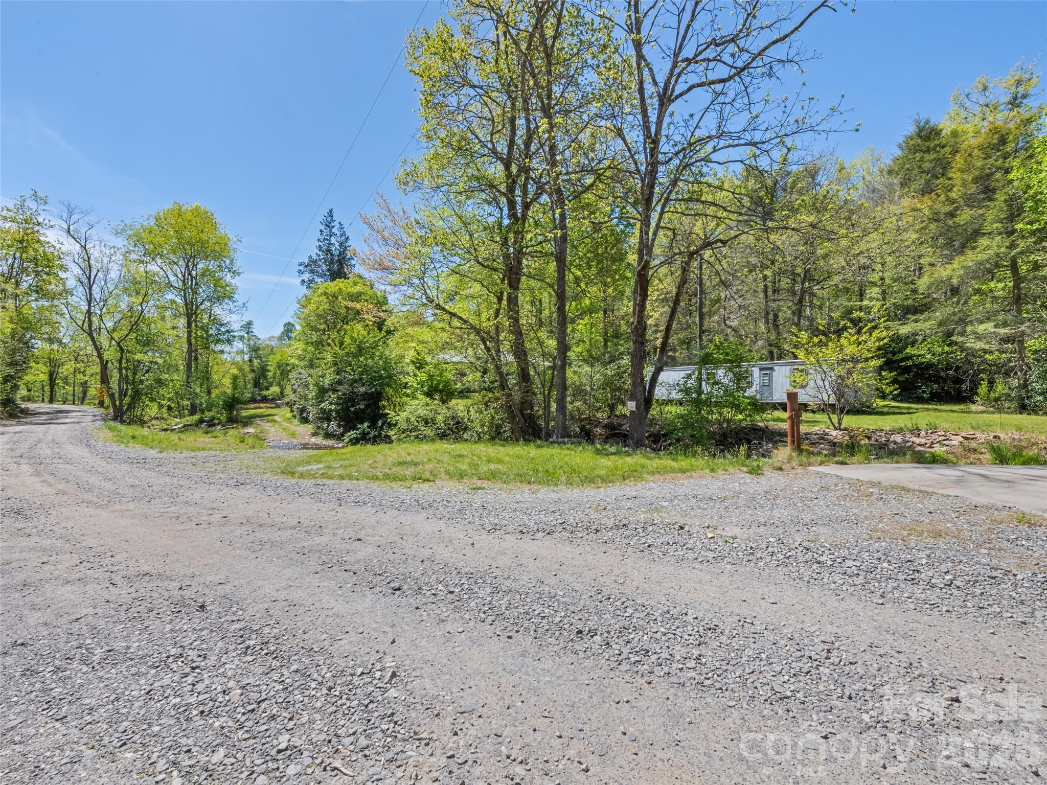 1372 Sand Branch Road Black Mountain, NC 28711 - Photo 38 of 45 a view of a yard with basketball court