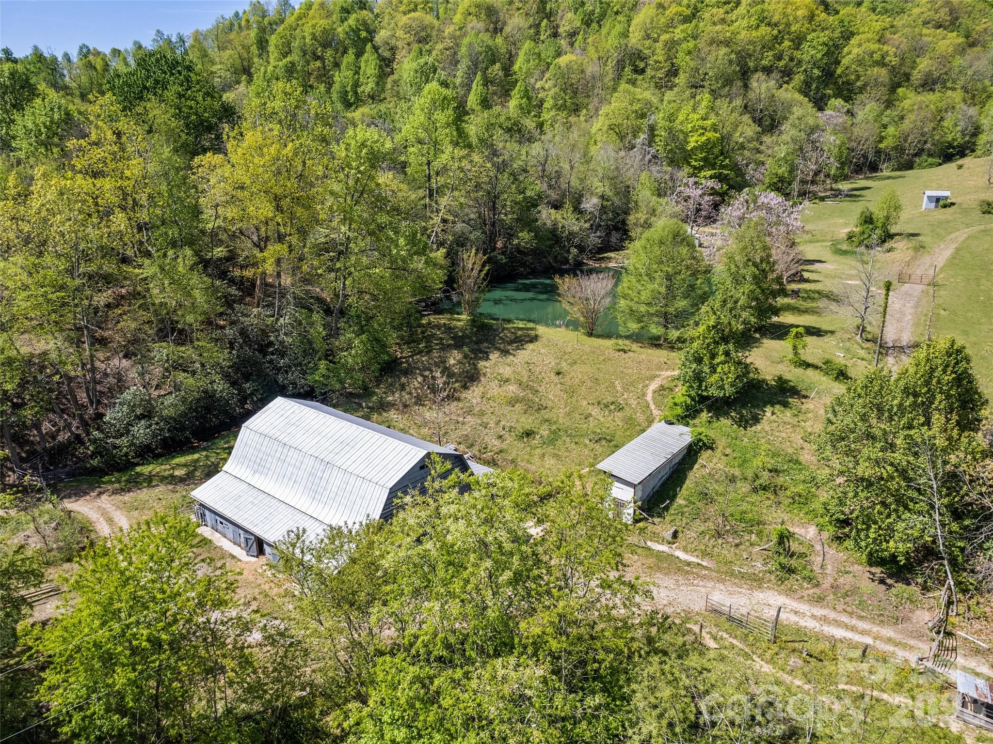 1372 Sand Branch Road Black Mountain, NC 28711 - Photo 7 of 45 an aerial view of residential house with outdoor space