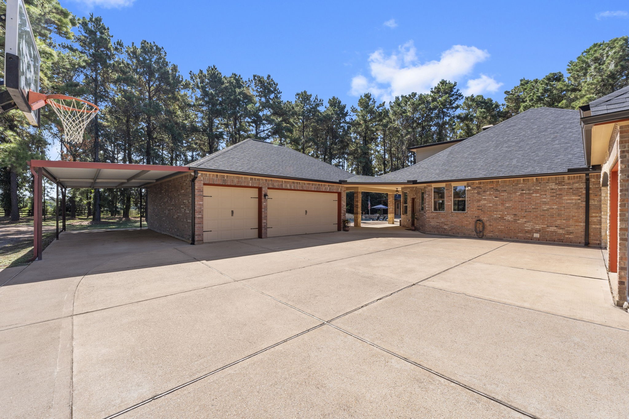 1534 Virgie Community Road Magnolia, TX 77354 - Photo 6 of 50 Oversized three car garage with lean-to attached. There is no lack of storage or space to park your finest cars on this property!