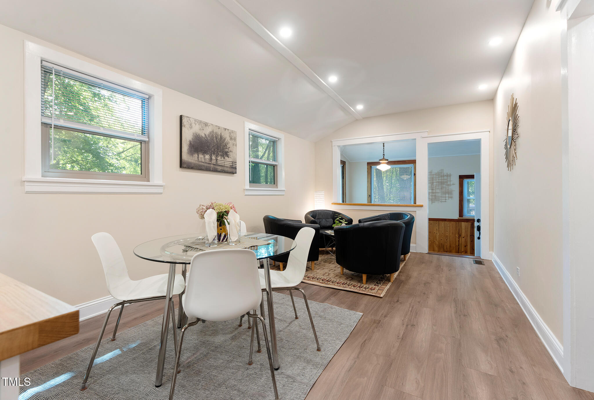 126 Barclay Road Chapel Hill, NC 27516 - Photo 14 of 39 a view of a dining room with furniture and windows