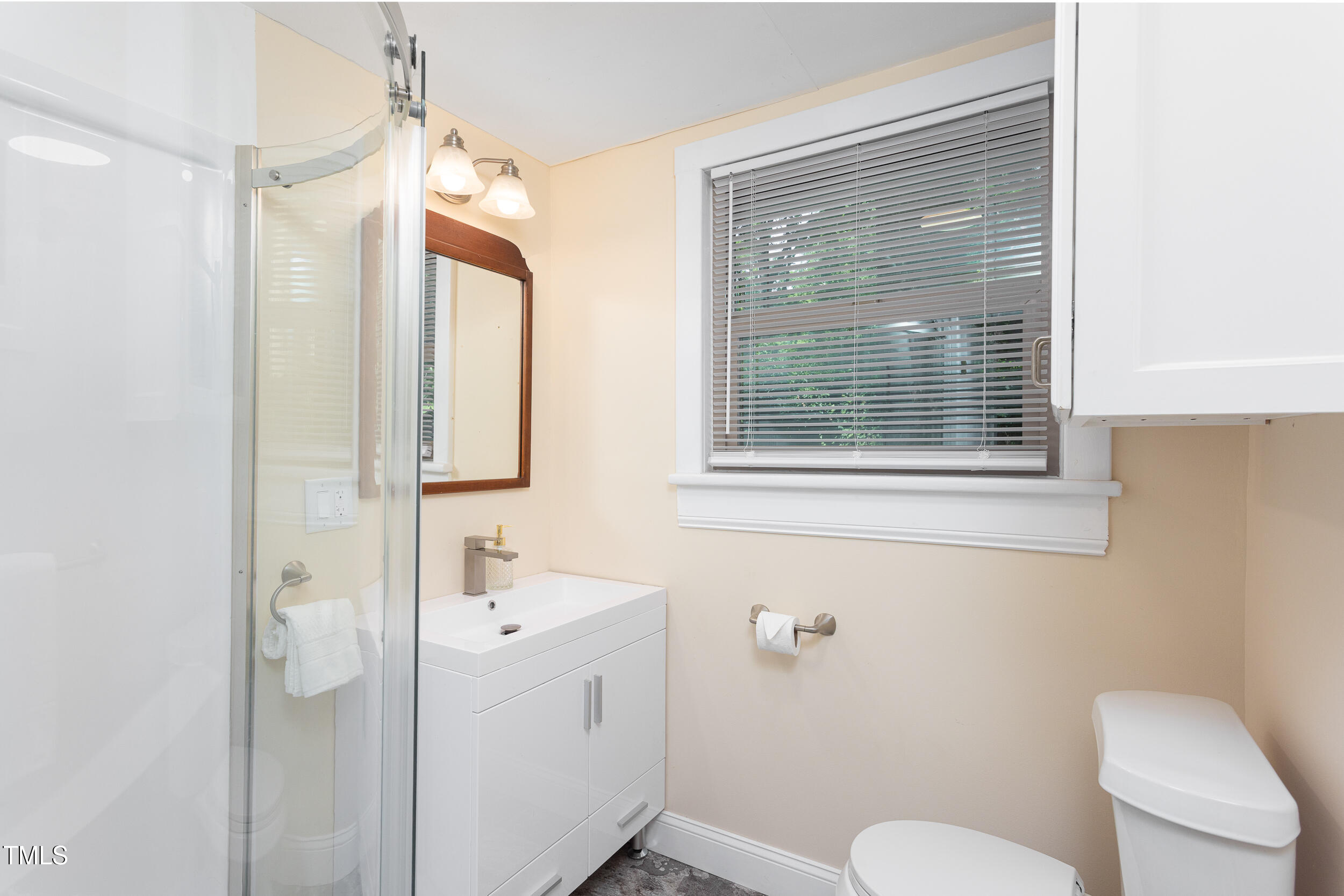 126 Barclay Road Chapel Hill, NC 27516 - Photo 24 of 39 a bathroom with a sink a toilet and shower