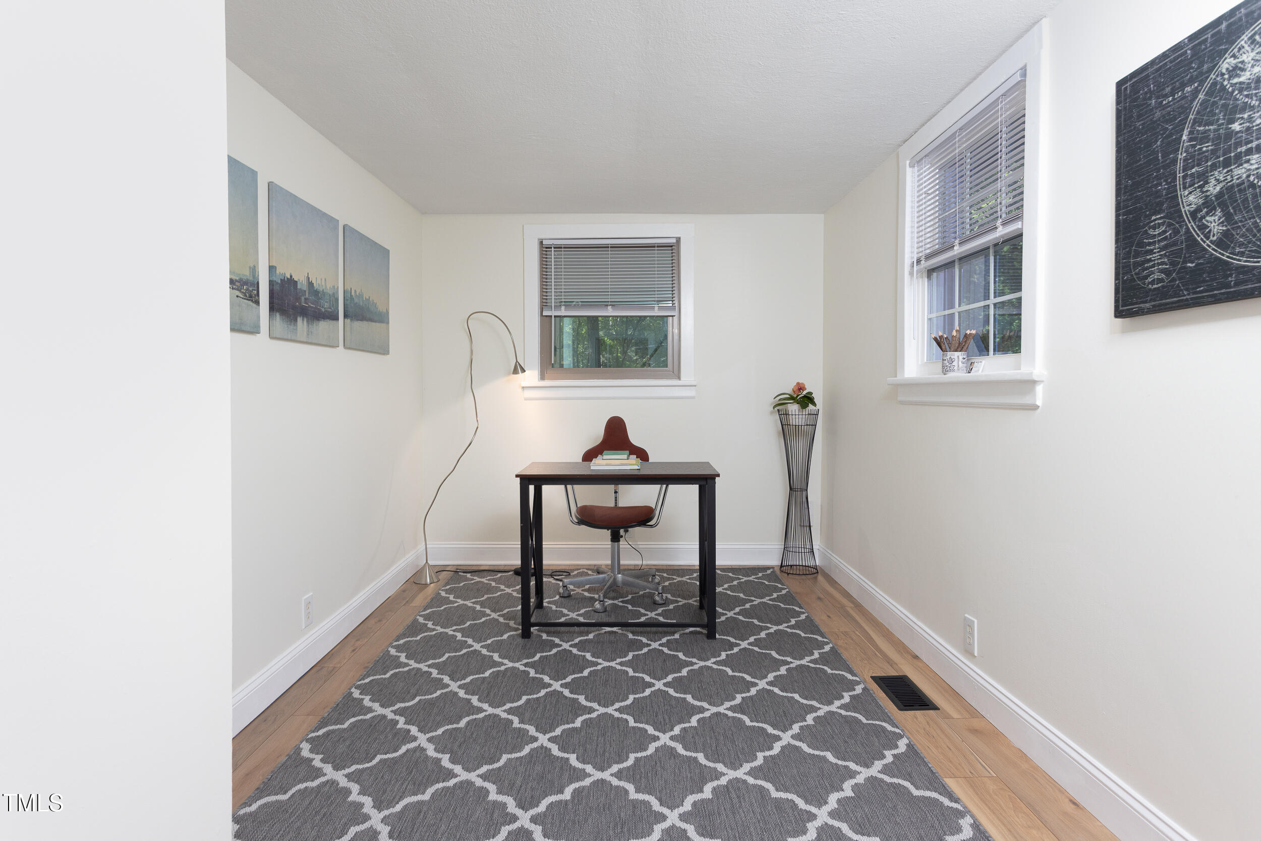 126 Barclay Road Chapel Hill, NC 27516 - Photo 25 of 39 a living room with furniture a table and a window
