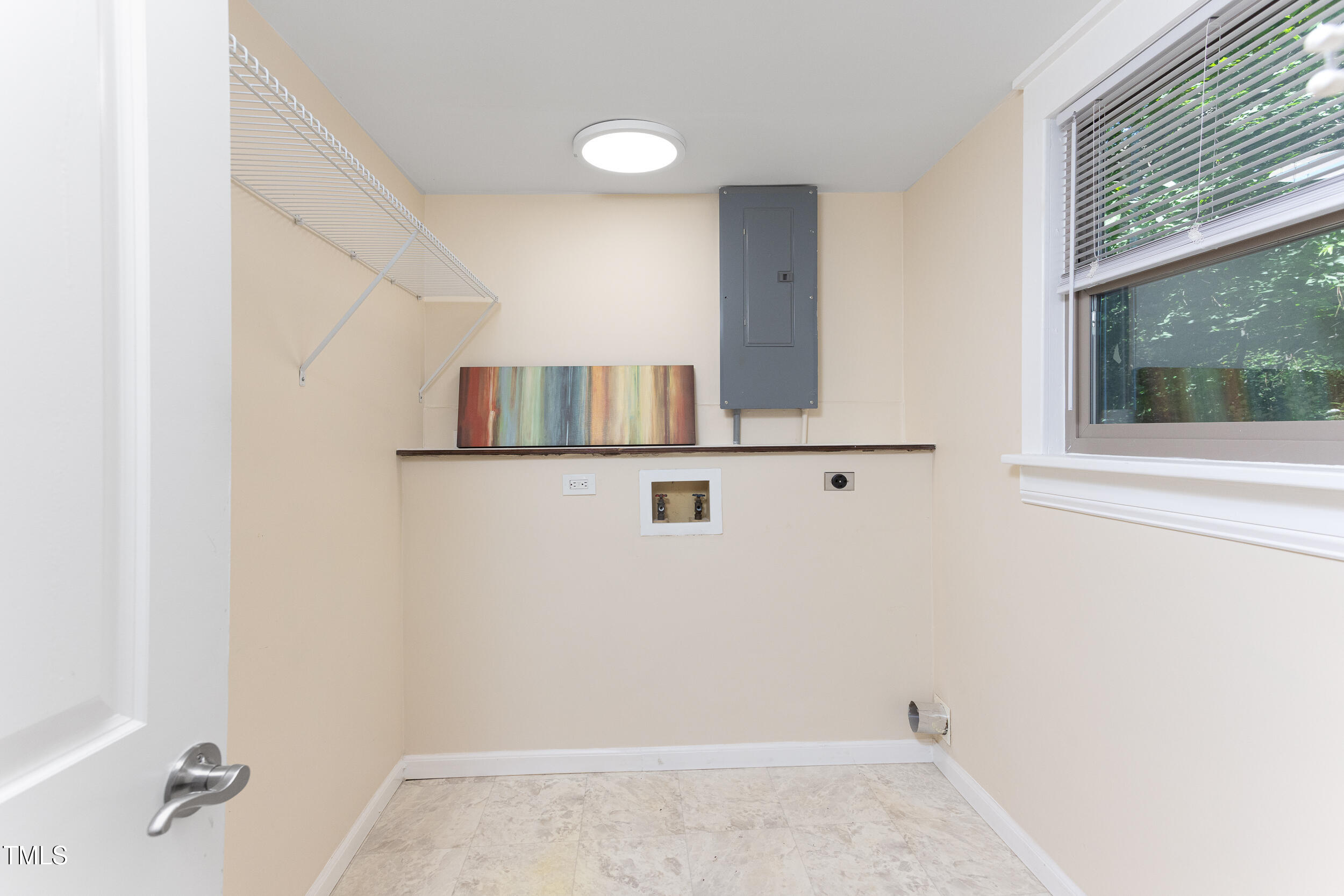 126 Barclay Road Chapel Hill, NC 27516 - Photo 32 of 39 a view of storage and utility room with windows
