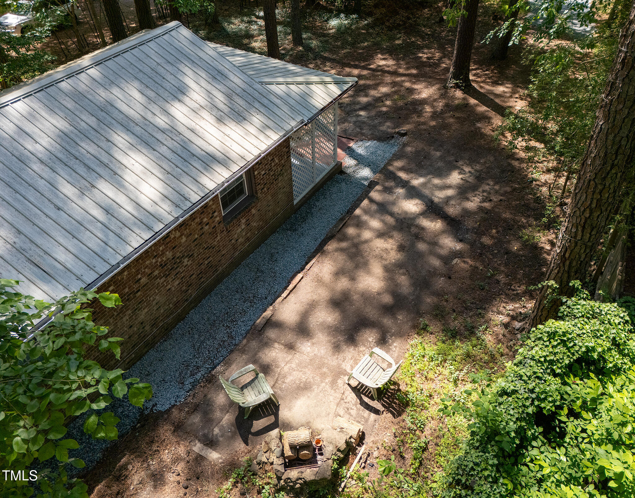 126 Barclay Road Chapel Hill, NC 27516 - Photo 33 of 39 a view of barbeque area with floor to ceiling window