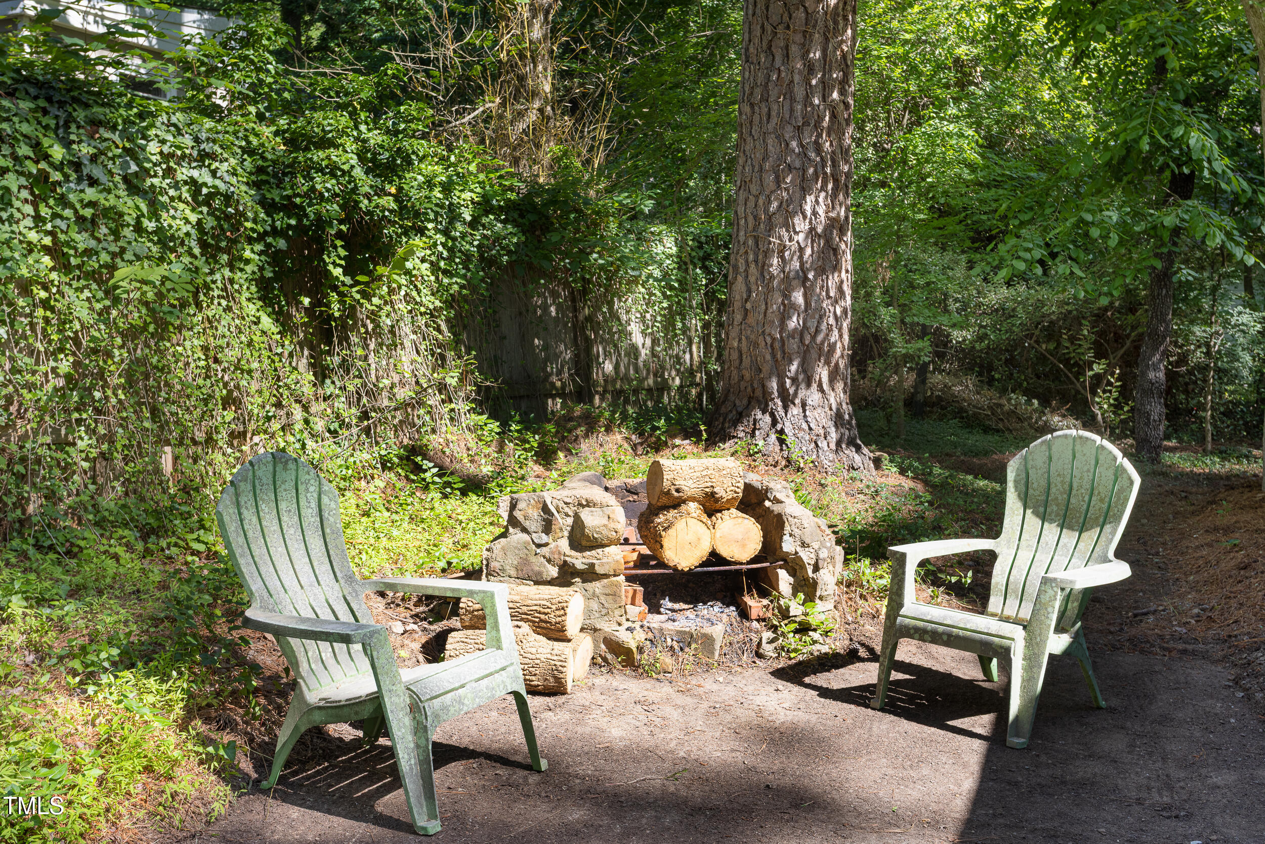 126 Barclay Road Chapel Hill, NC 27516 - Photo 34 of 39 a view of a chairs and table in backyard