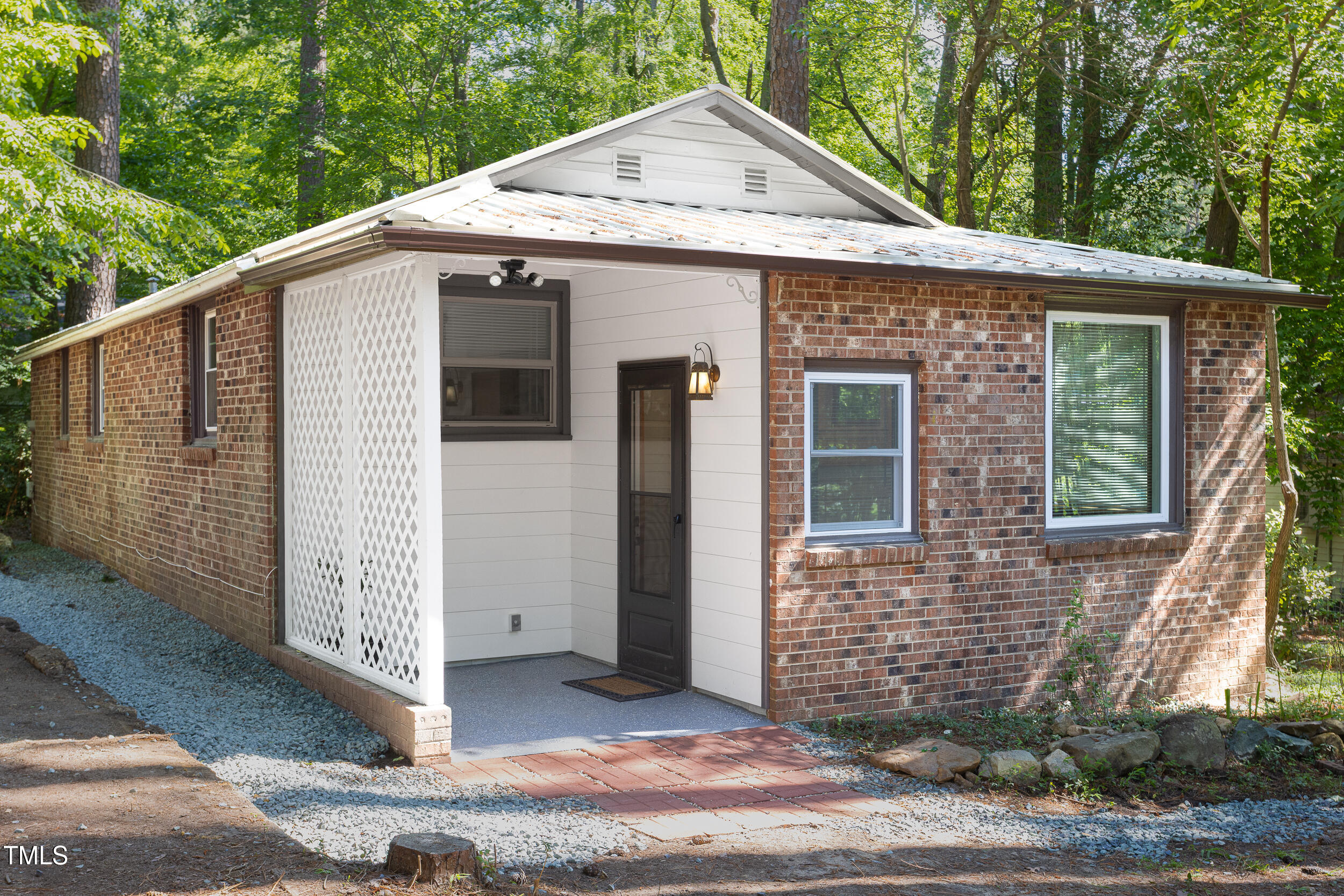 126 Barclay Road Chapel Hill, NC 27516 - Photo 38 of 39 a front view of a house with a yard