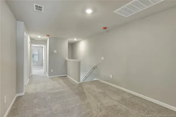 an empty room with a natural light