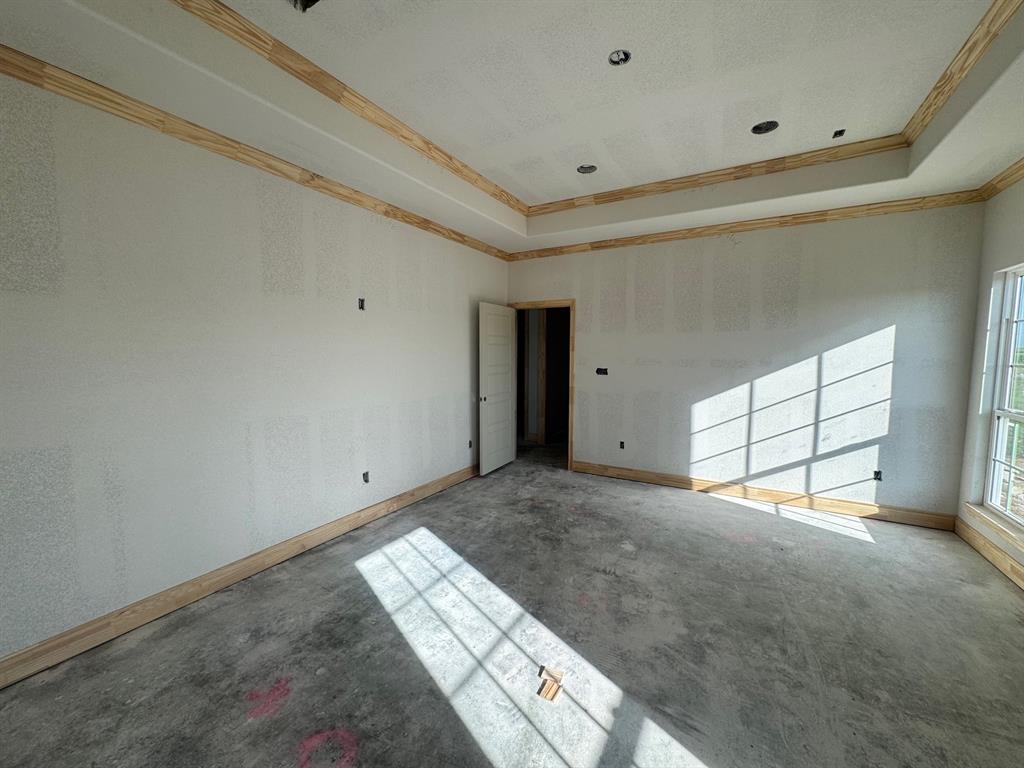 173 Willow Branch Road McGregor, TX 76657 - Photo 7 of 18 a view of empty room with windows
