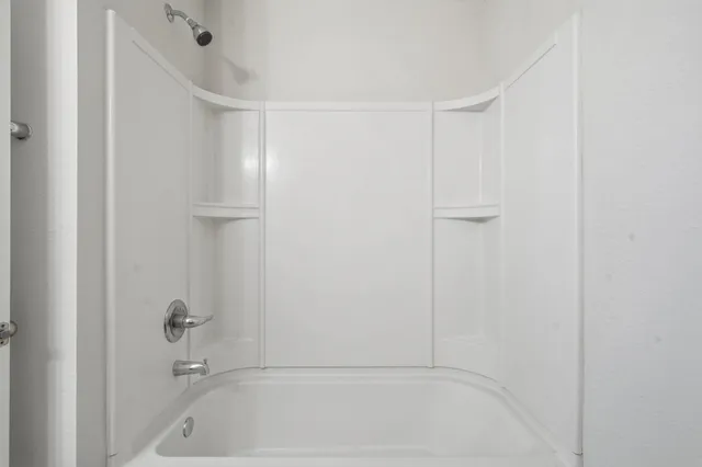 a bathroom with a bathtub