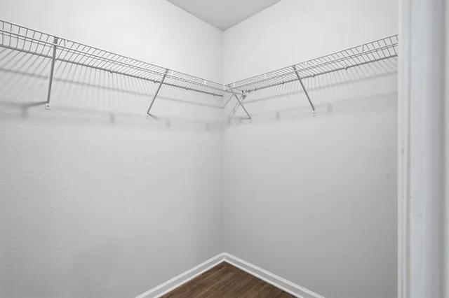 a view of a room with racks on the wall