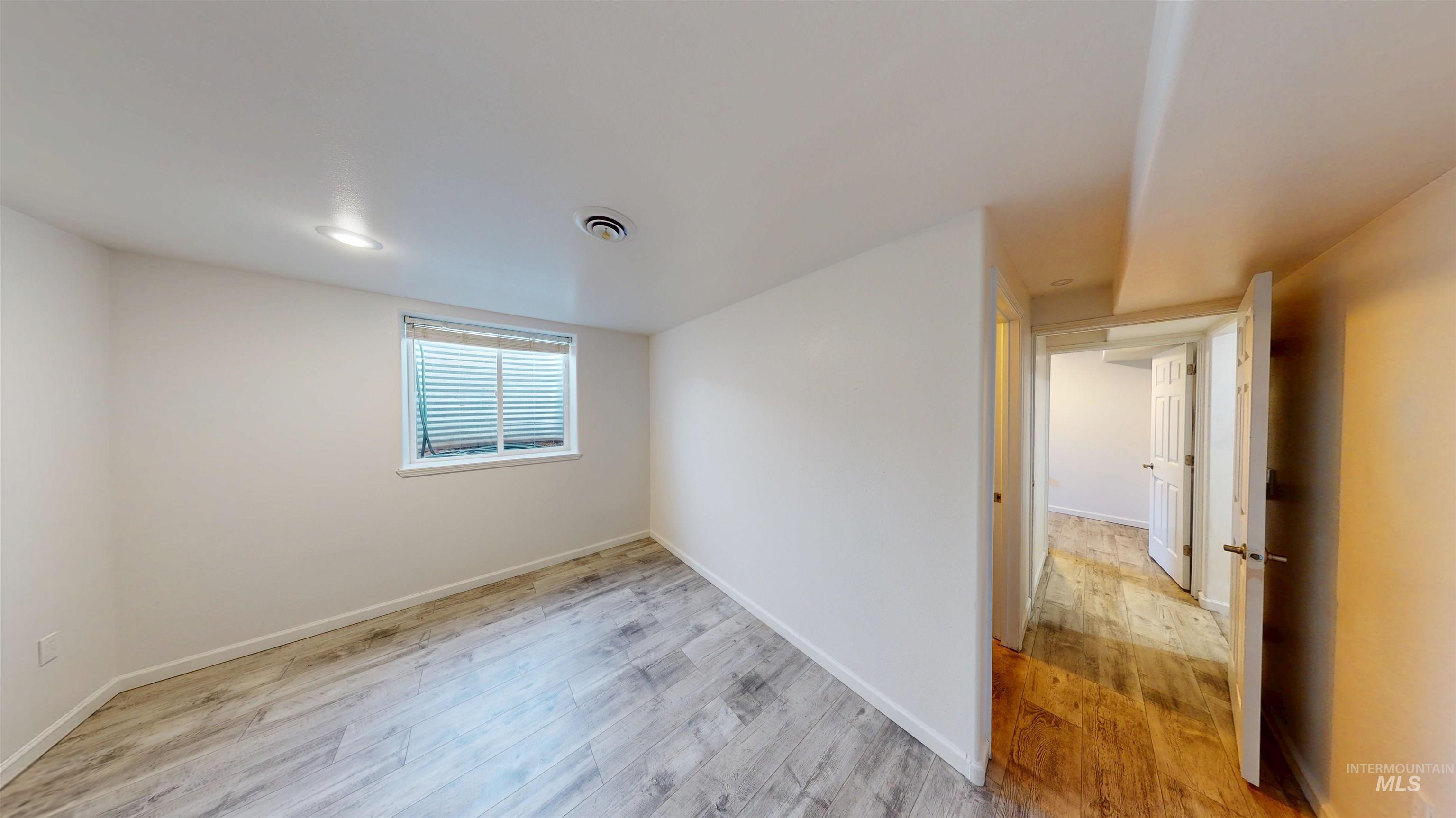 1030 Reams Road Moscow, ID 83843 - Photo 36 of 50 Unfurnished room featuring light wood-style flooring and baseboards