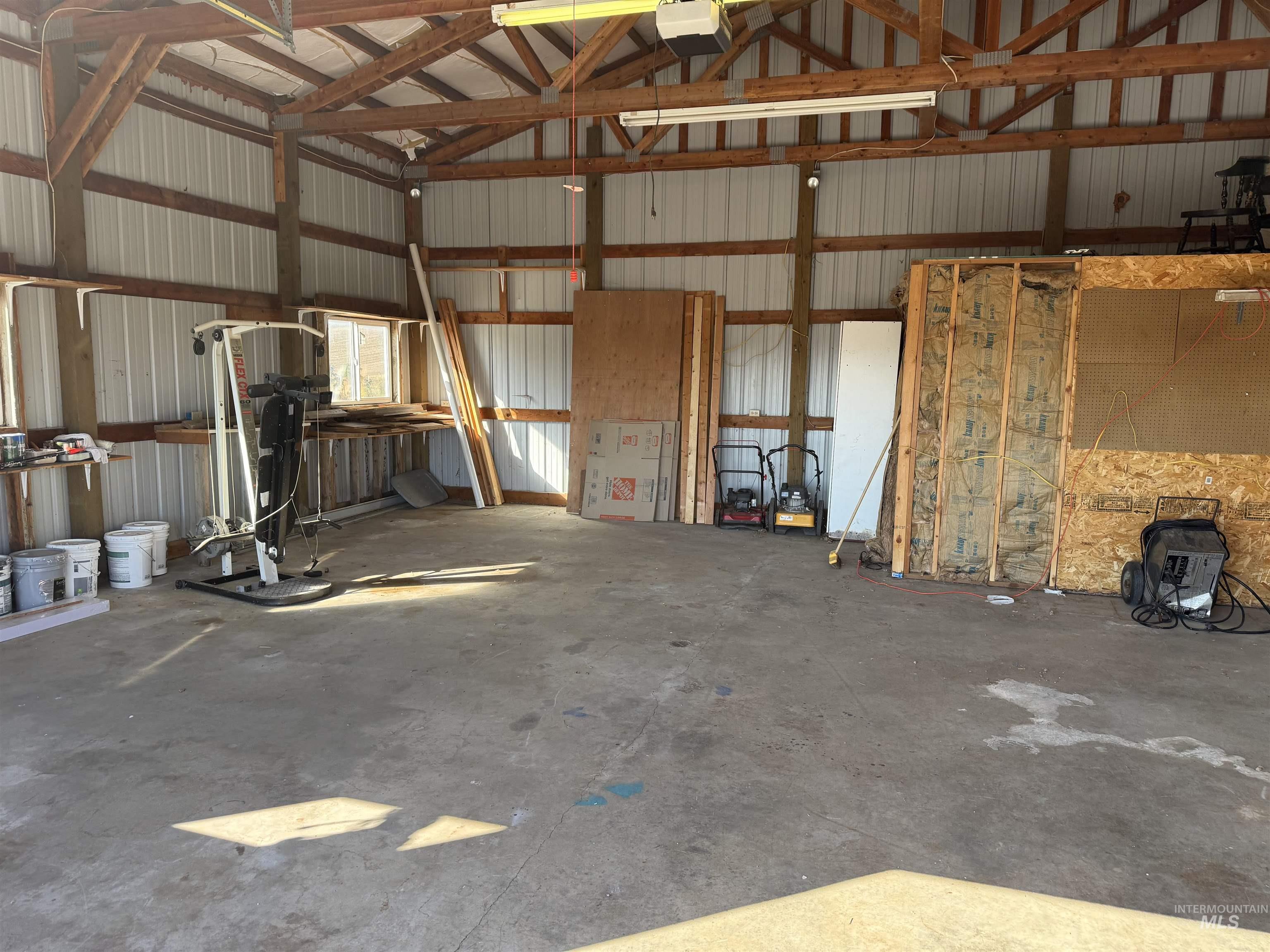 1030 Reams Road Moscow, ID 83843 - Photo 38 of 50 Garage with metal wall and a garage door opener