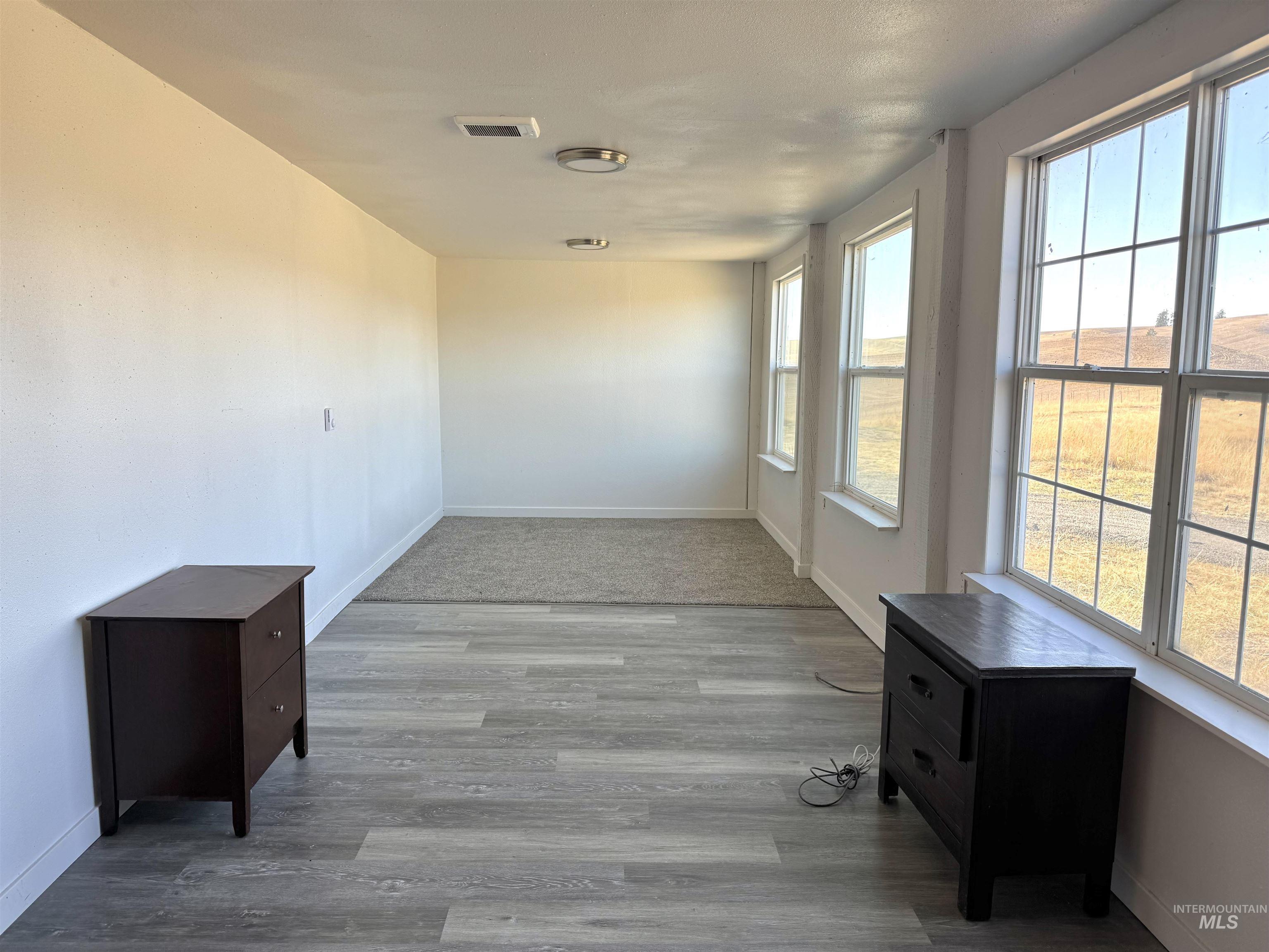 1030 Reams Road Moscow, ID 83843 - Photo 42 of 50 Empty room with baseboards and light wood-style flooring