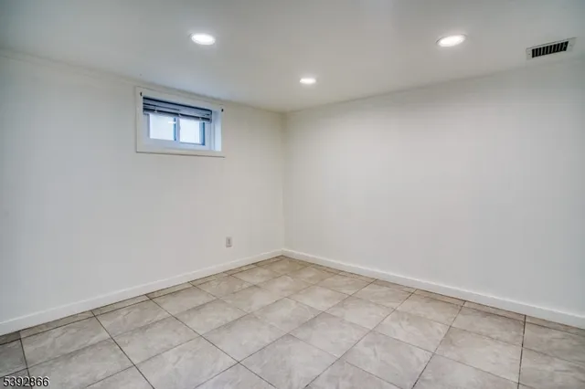 a bathroom with a sink toilet and mirror