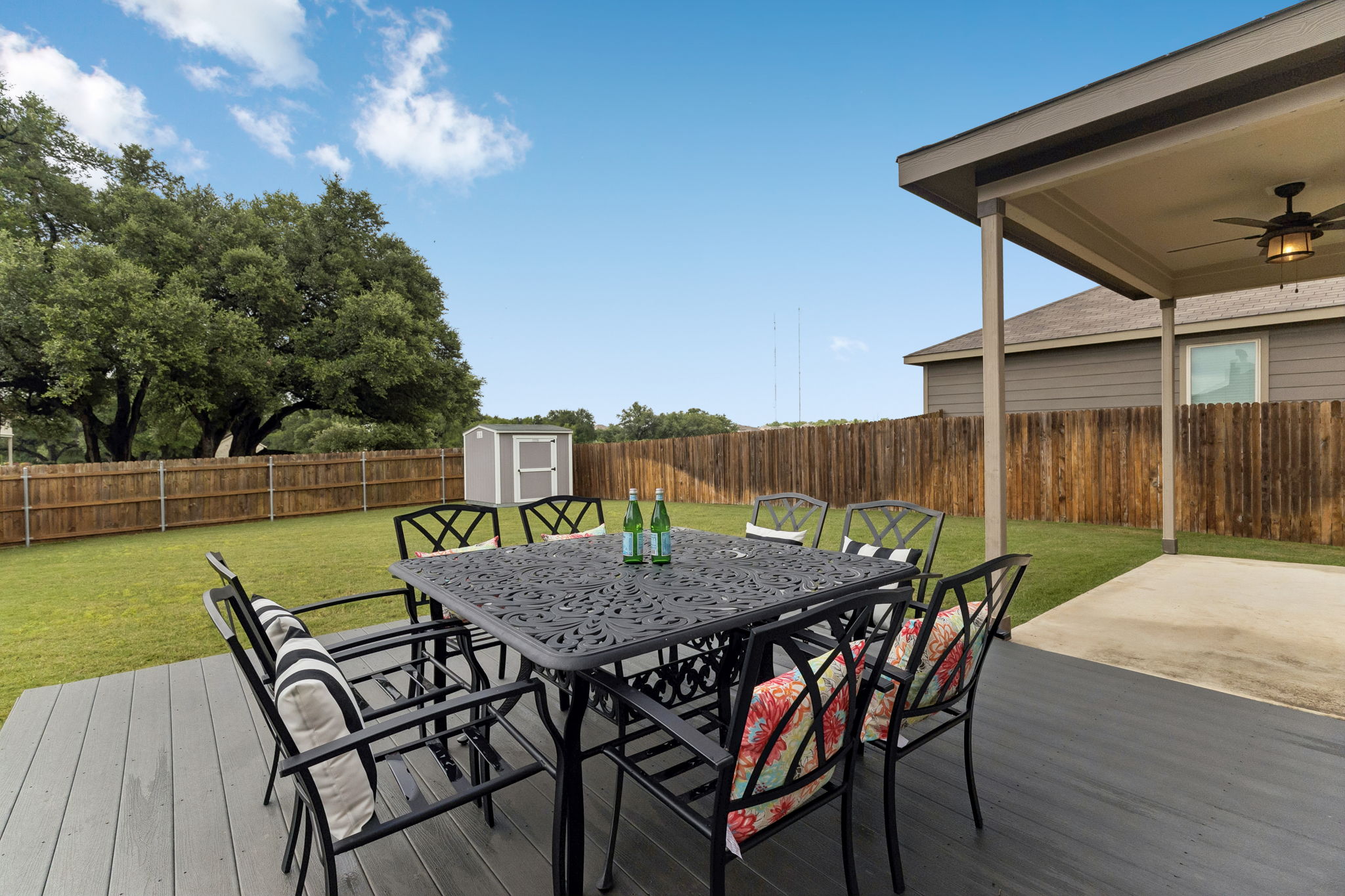 809 Whitman Avenue Georgetown, TX 78626 - Photo 4 of 35 a view of a roof deck with table and chairs with wooden floor and fence