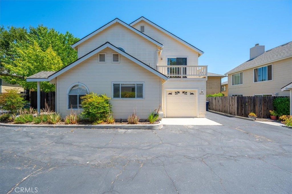 9325 Musselman Drive Atascadero, CA 93422 - Photo 1 of 1 a front view of a house with a yard and garage