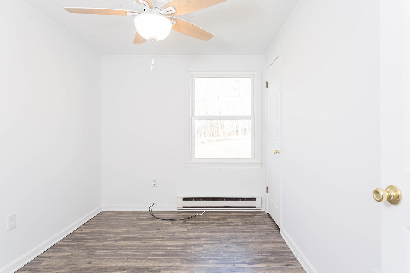2792 Sandy Level Road Goodview, VA 24095 - Photo 14 of 34 a view of an empty room with a window
