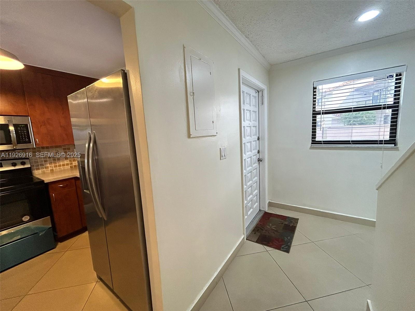 13444 Southwest 62nd Street, Unit 104F Miami, FL 33183 - Photo 11 of 40 a view of kitchen