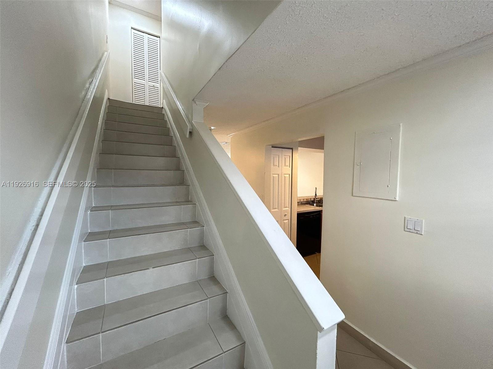 13444 Southwest 62nd Street, Unit 104F Miami, FL 33183 - Photo 19 of 40 a view of entryway