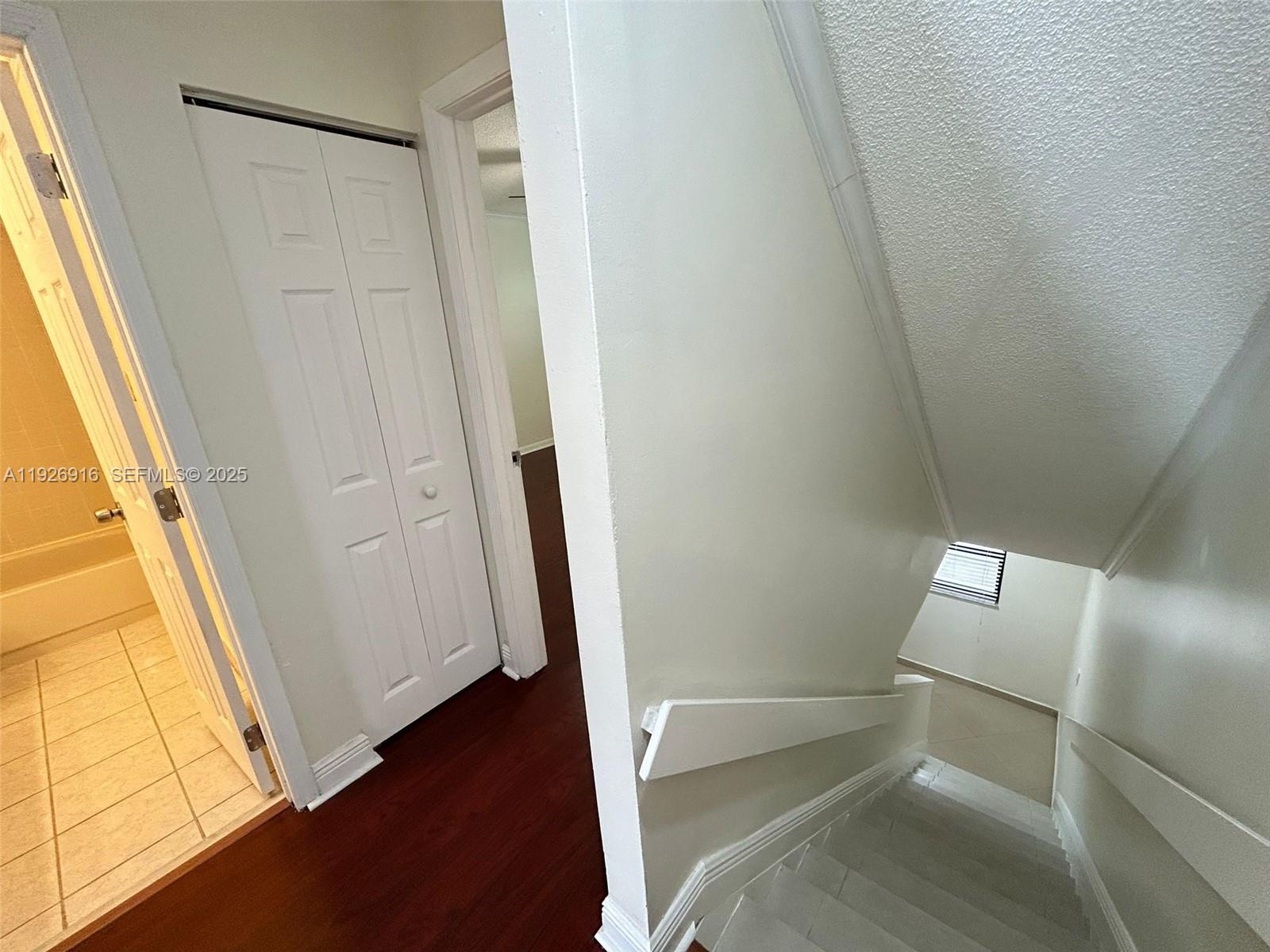 13444 Southwest 62nd Street, Unit 104F Miami, FL 33183 - Photo 21 of 40 a view of an empty room