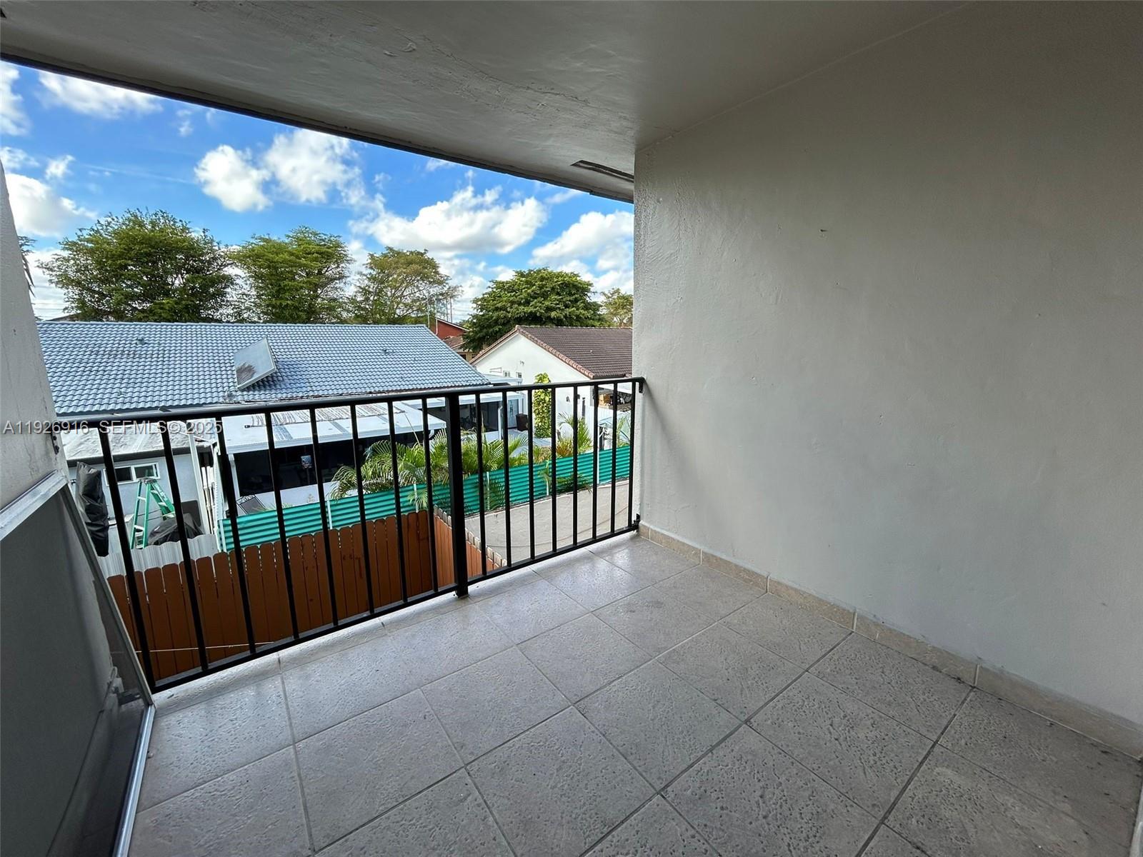 13444 Southwest 62nd Street, Unit 104F Miami, FL 33183 - Photo 39 of 40 a view of a porch