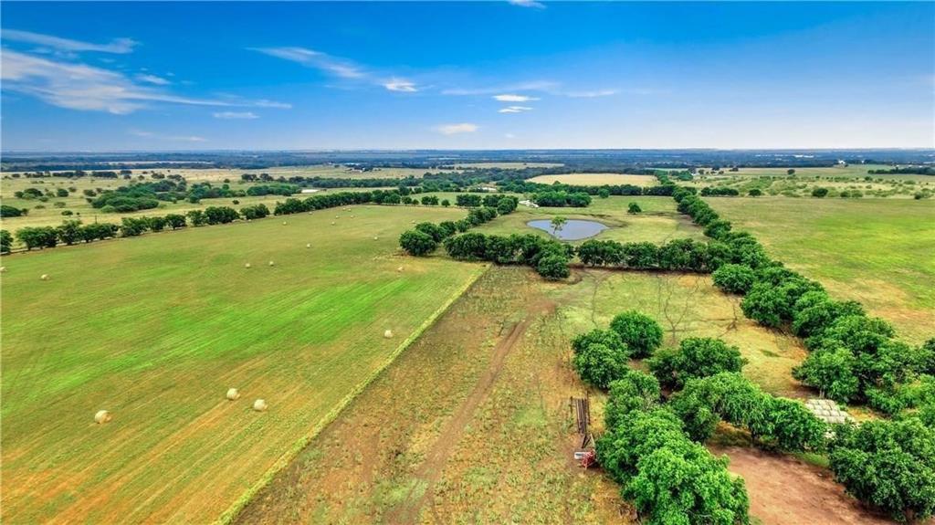 0 Airport Road Tioga, TX 76271 - Photo 2 of 3 a view of an ocean & house with a yard