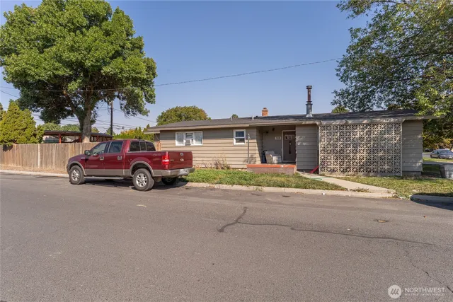 a car parked in front of a house