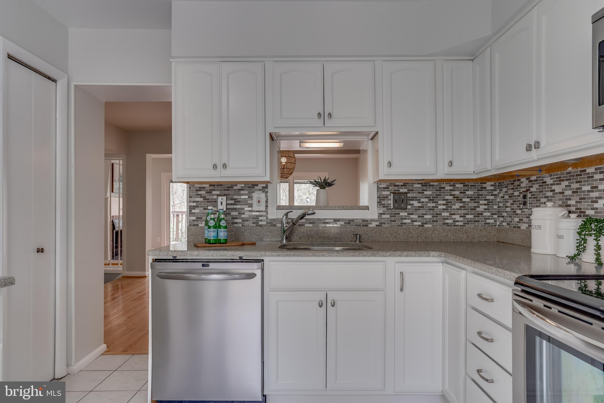 1601 Valencia Way Reston, VA 20190 - Photo 26 of 55 Pantry door on the left!