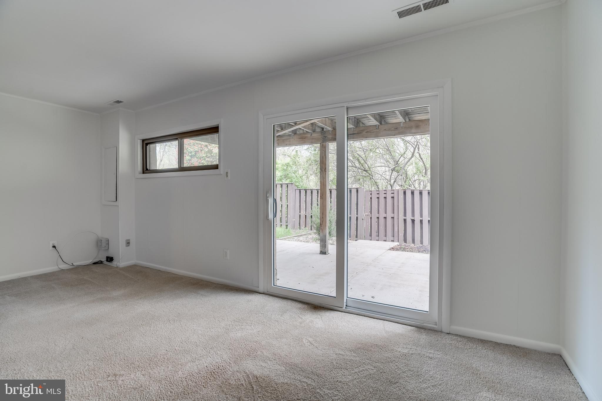 1601 Valencia Way Reston, VA 20190 - Photo 36 of 55 Lower level family room w/ walk-out to patio