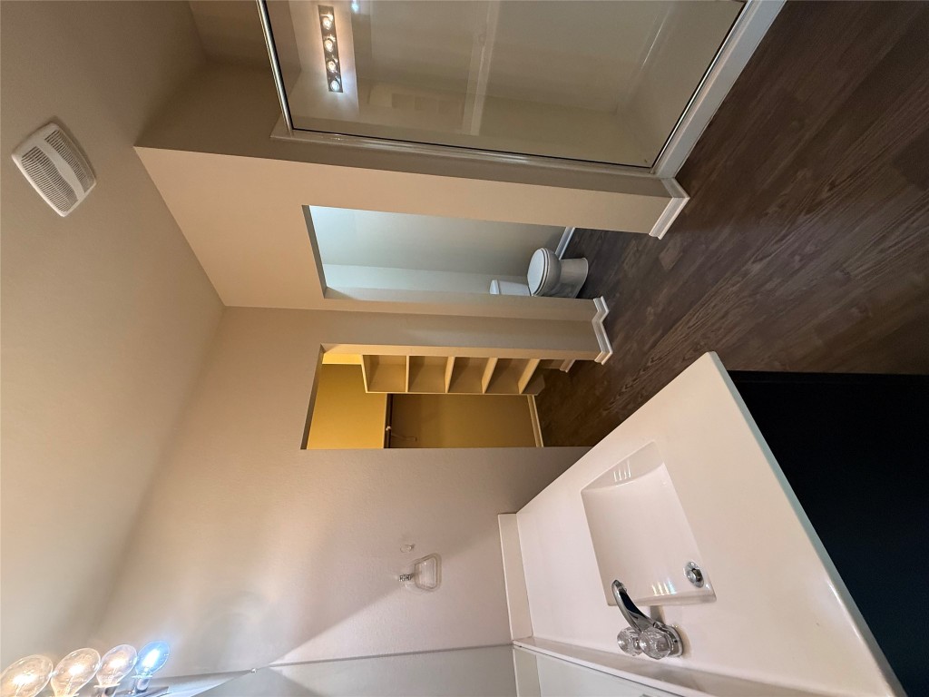 1701 Atlas Road Cedar Park, TX 78613 - Photo 11 of 23 a view of a bathroom with a sink and a toilet