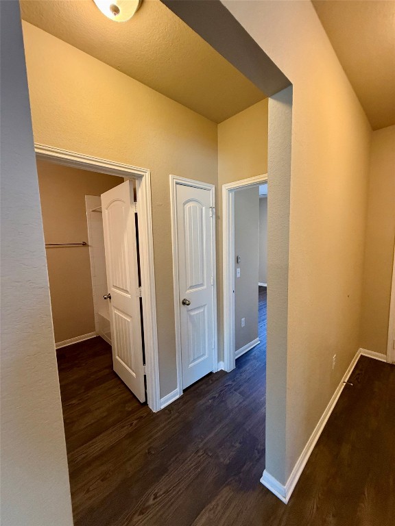 1701 Atlas Road Cedar Park, TX 78613 - Photo 15 of 23 a view of a hallway with wooden floor