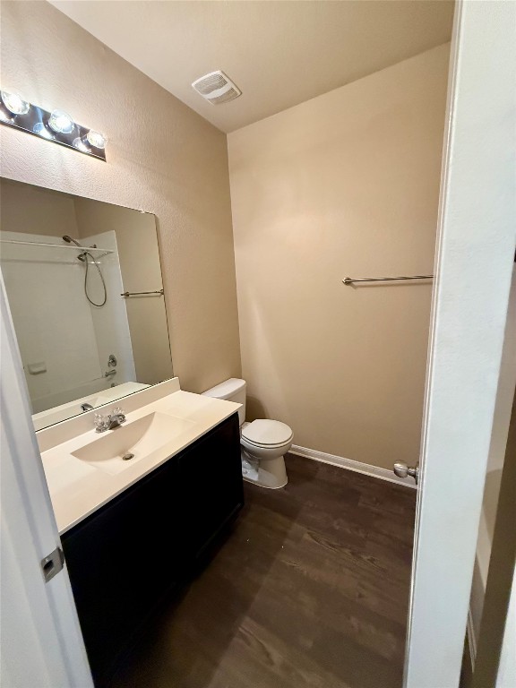 1701 Atlas Road Cedar Park, TX 78613 - Photo 18 of 23 a bathroom with a sink a toilet and mirror