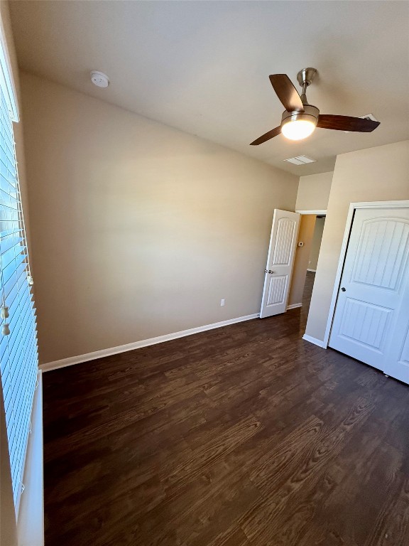 1701 Atlas Road Cedar Park, TX 78613 - Photo 20 of 23 a view of an empty room with wooden floor and a window