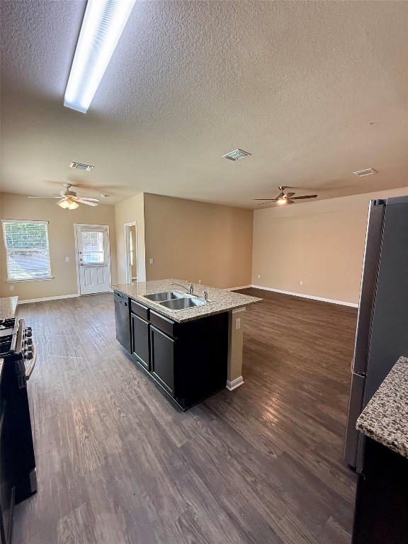 1701 Atlas Road Cedar Park, TX 78613 - Photo 5 of 23 a large room with wooden floor
