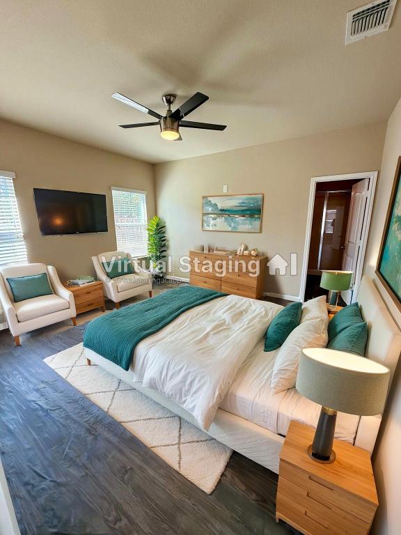 1701 Atlas Road Cedar Park, TX 78613 - Photo 9 of 23 a bedroom with furniture and wooden floor