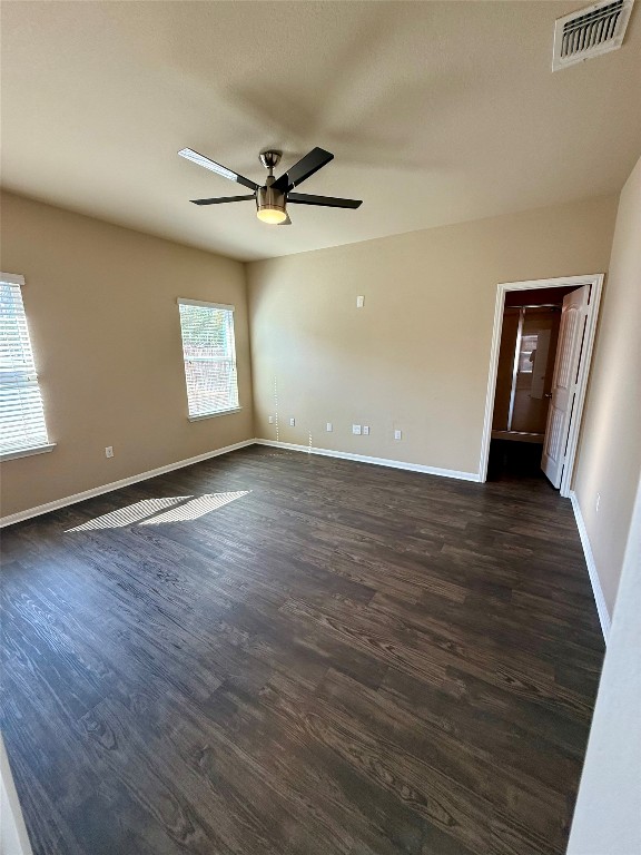 1701 Atlas Road Cedar Park, TX 78613 - Photo 10 of 23 an empty room with wooden floor fan and windows